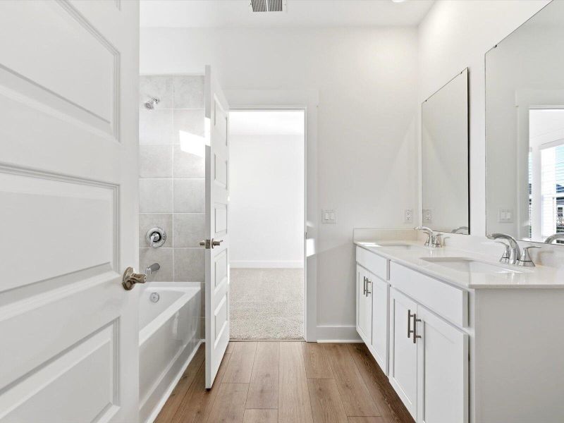 Furnished interior view inside a new home in The Coves at Lakes of Cane Bay, Summerville (Image 34). Furnished interior view inside a new home in The Coves at Lakes of Cane Bay, Summerville (Image 34).