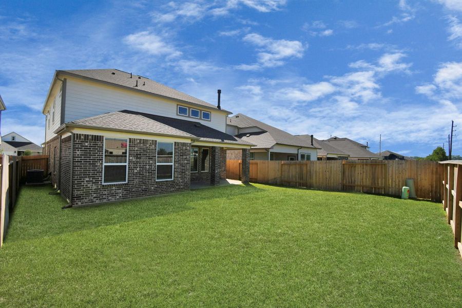 Exterior details and patio area of a home in Telge Ranch, Cypress (Image 4).