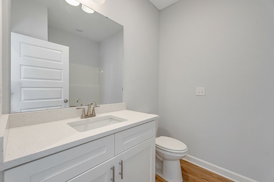 Furnished interior view inside a new home in Live Oak Cottages, Freeport (Image 11).