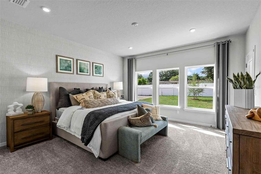 Furnished interior view inside a new home in The Cypress Series at Reserve East, Flagler Beach (Image 11).