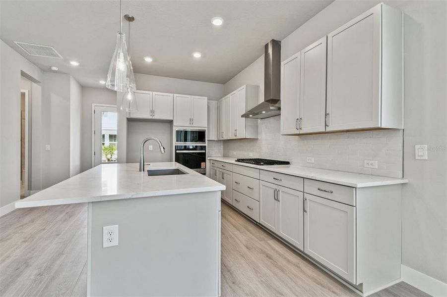 Furnished interior view inside a new home in Emerald Landing at Waterside at Lakewood Ranch – Cottage Series, Sarasota (Image 10). Furnished interior view inside a new home in Emerald Landing at Waterside at Lakewood Ranch – Cottage Series, Sarasota (Image 10).