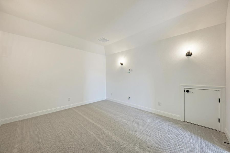 Empty room featuring carpet floors