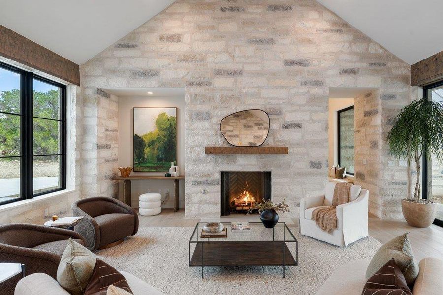 The stone fireplace serves as a stunning focal point. The stone fireplace serves as a stunning focal point.
