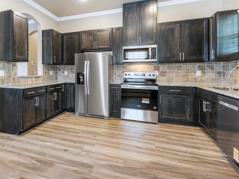 Furnished interior view inside a new home in , Bonham (Image 13).