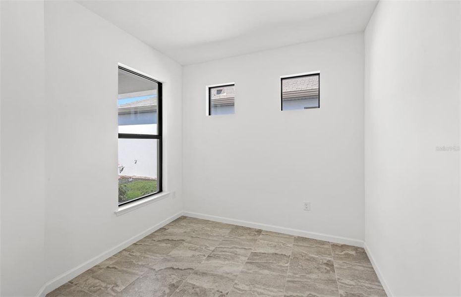 Spacious, unfurnished interior of a new home in Arbor Oaks, North Port (Image 12). Spacious, unfurnished interior of a new home in Arbor Oaks, North Port (Image 12).