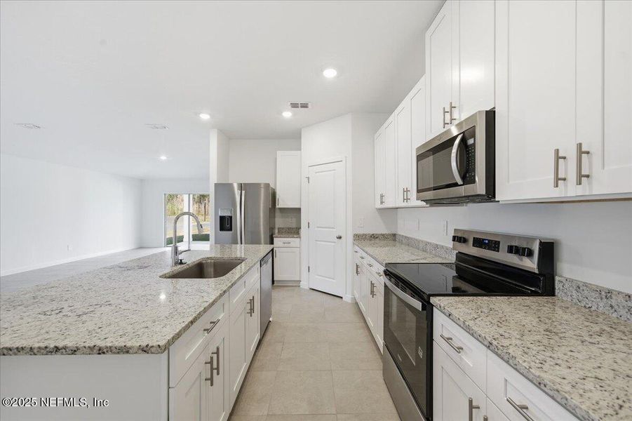 Furnished interior view inside a new home in Azalea Creek, Jacksonville (Image 5).