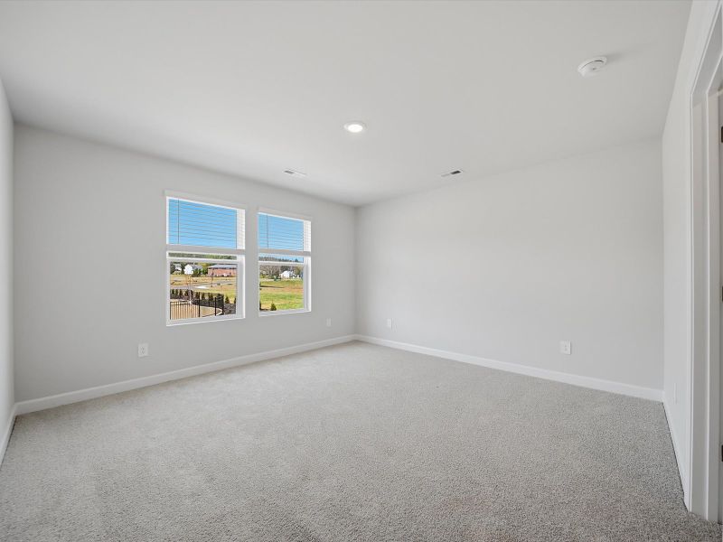 Spacious, unfurnished interior of a new home in Crossing at Abner Creek Townes, Greer (Image 16).