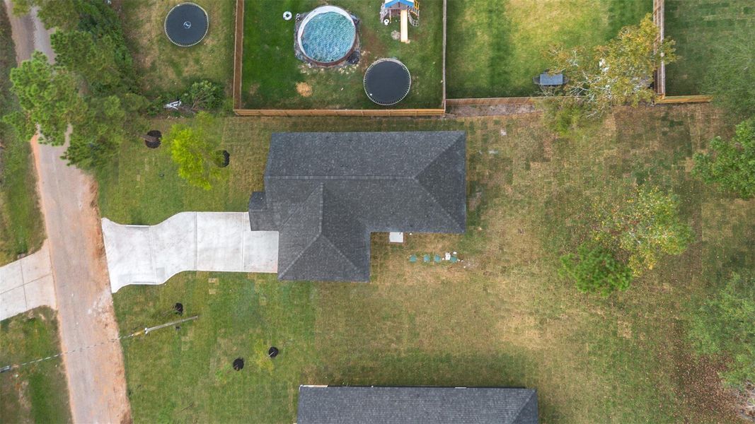 Front exterior of a new home in , Willis, TX, highlighting curb appeal (Image 19). Front exterior of a new home in , Willis, TX, highlighting curb appeal (Image 19).