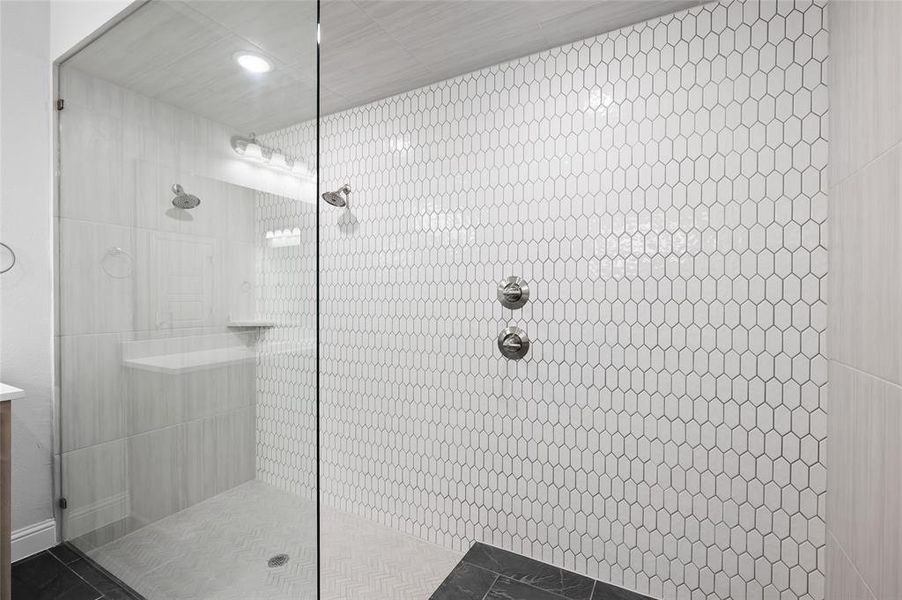 Bathroom featuring a walk in shower and recessed lighting Bathroom featuring a walk in shower and recessed lighting