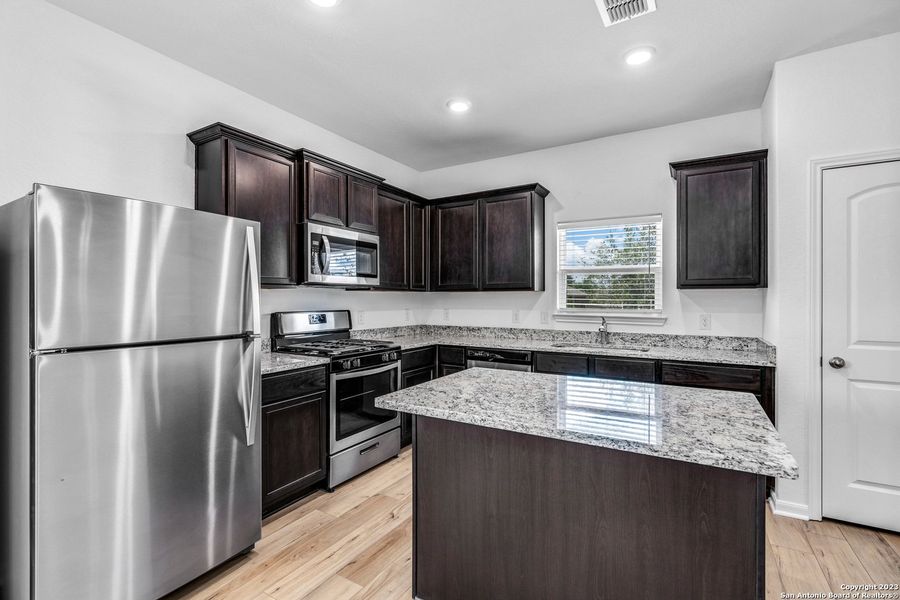 Furnished interior view inside a new home in Luckey Ranch, San Antonio (Image 6).