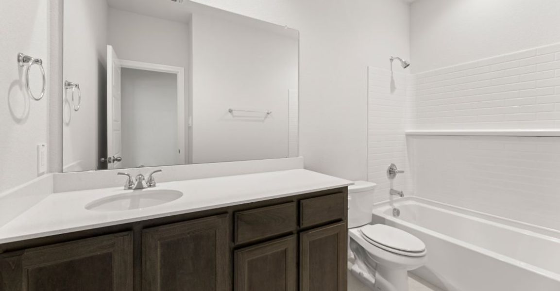 Representative exterior photo of a completed home built from the Hickory by Impression Homes in ValleyBrooke, Mesquite, TX (Image 19).