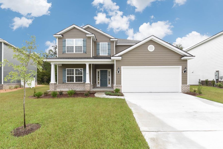 Representative exterior photo of a completed home built from the Kingston by Ernest Homes in Wexford, Richmond Hill, GA (Image 29).