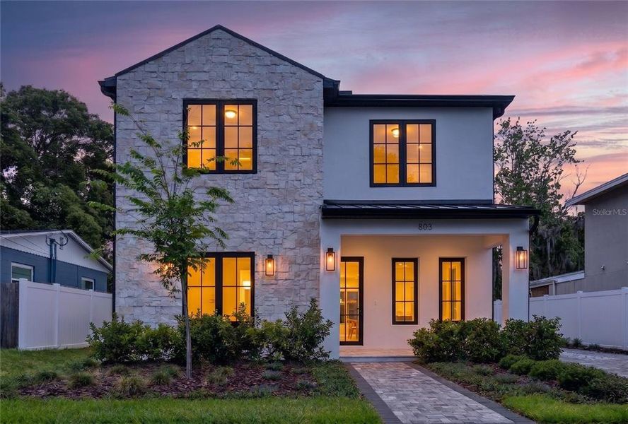 Front exterior of a new home in , Orlando, FL, highlighting curb appeal (Image 2). Front exterior of a new home in , Orlando, FL, highlighting curb appeal (Image 2).