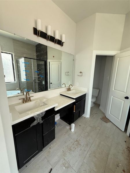 Double sinks with a convenient vanity space in between!