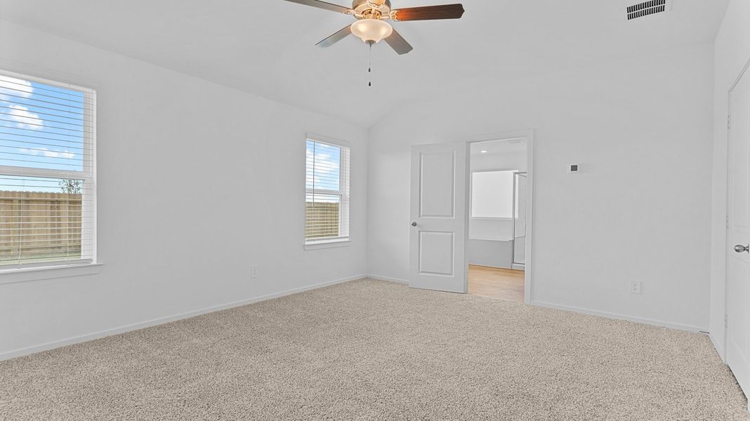 Spacious, unfurnished interior of a new home in Caldwell Crossing, Iowa Colony (Image 16).