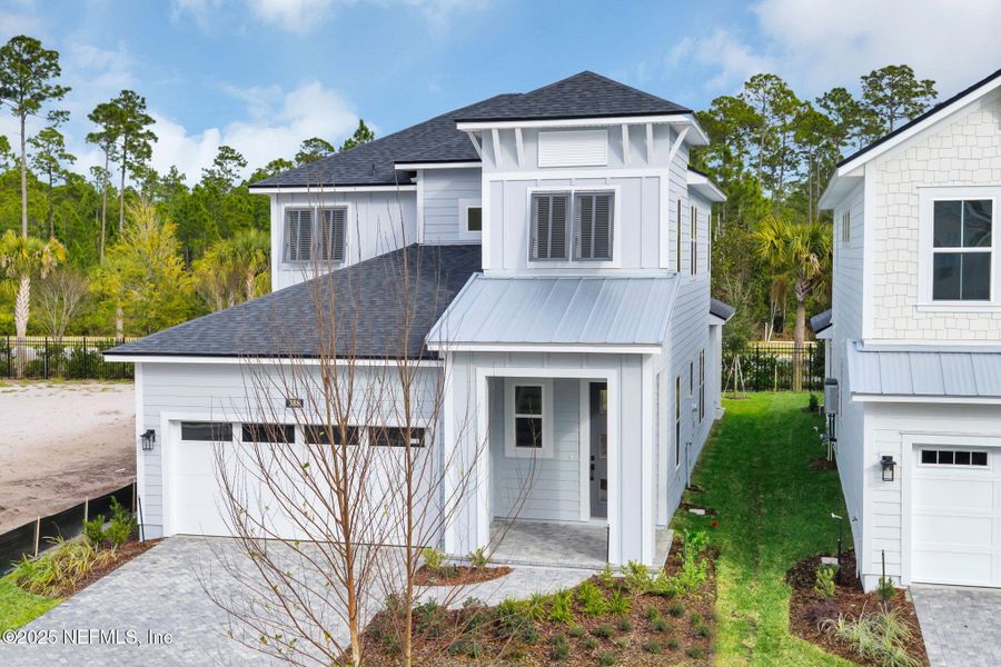 Front exterior of a new home in , Ponte Vedra, FL, highlighting curb appeal (Image 26).