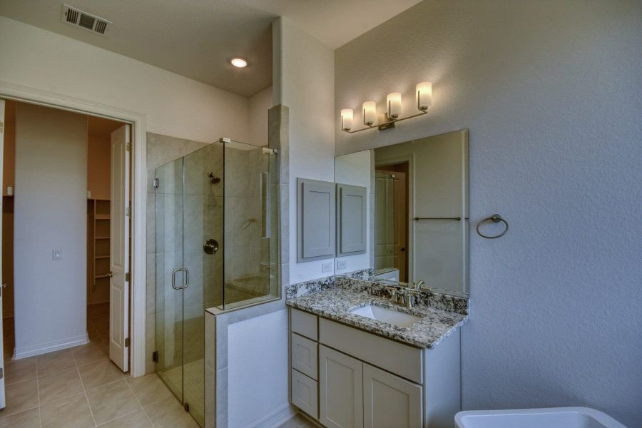 Furnished interior view inside a new home in El Sonido at Campanas, San Antonio (Image 13).