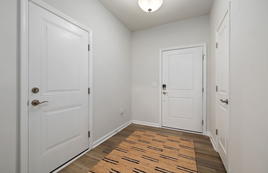 Spacious, unfurnished interior of a new home in Saunders Farm, Willow Spring (Image 22).