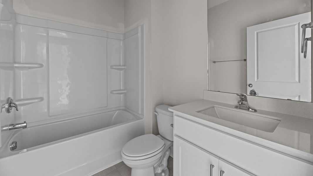 Furnished interior view inside a new home in Tyler - Home on the Lake, New Bern (Image 6). Furnished interior view inside a new home in Tyler - Home on the Lake, New Bern (Image 6).