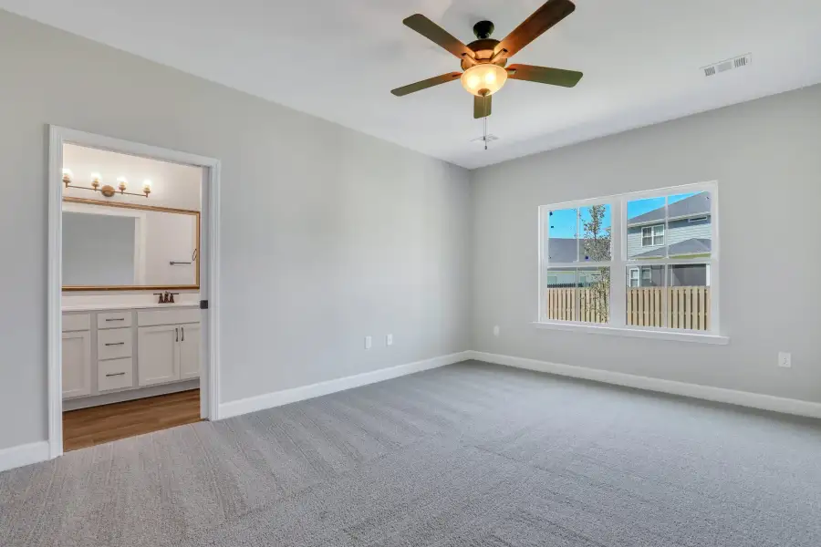 Sherwood – Main-Level Primary Bedroom with Backyard View
