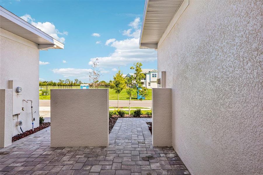 Exterior details and patio area of a home in Lagoon Residences at Epperson, Wesley Chapel (Image 29).