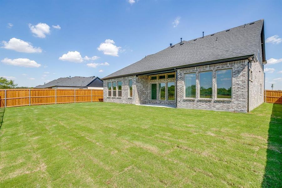 Exterior details and patio area of a home in Pecan Grove, Burleson (Image 2).