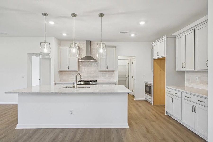 Kitchen featuring the AW Collection® Milan - Chic gray finishes and smooth surfaces shine. Kitchen featuring the AW Collection® Milan - Chic gray finishes and smooth surfaces shine.