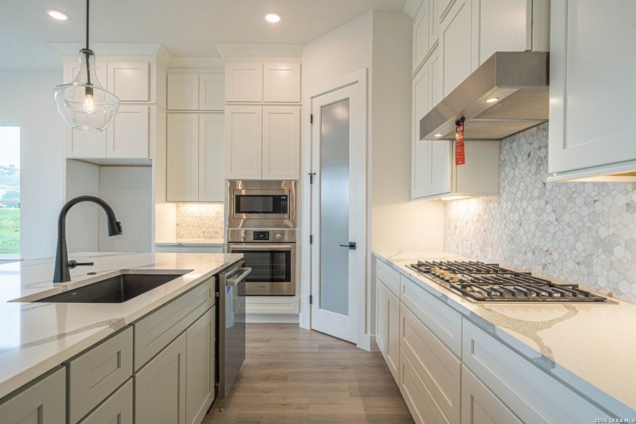 Furnished interior view inside a new home in , Kerrville (Image 13).