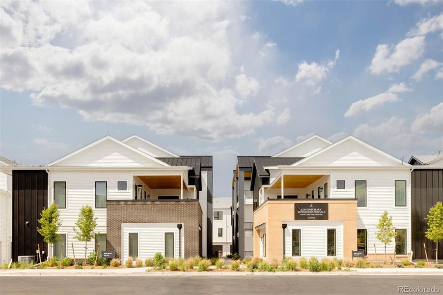 Front exterior of a new home in A Line Townhomes, Denver, CO, highlighting curb appeal (Image 23).