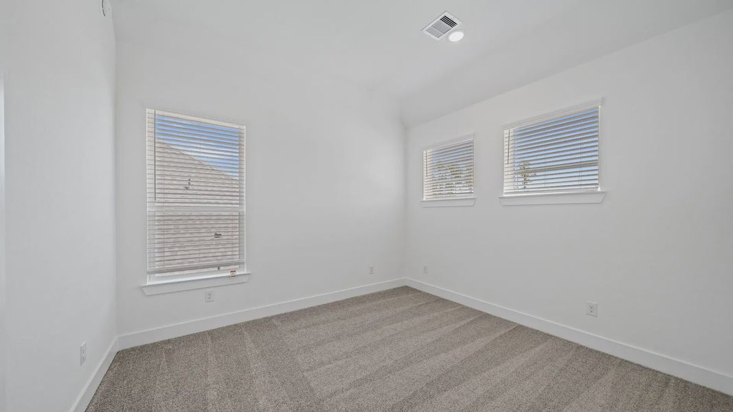 Representative unfurnished interior of a home built from the Waterloo by Chesmar Homes in Attwater 65's, Waller (Image 38).