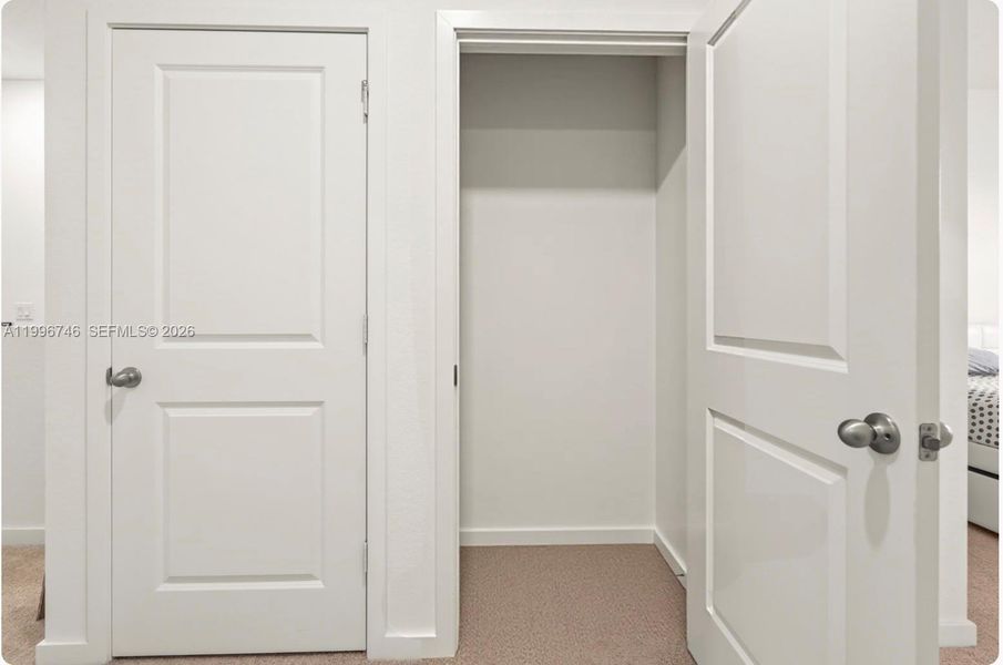 2 closets in hallway