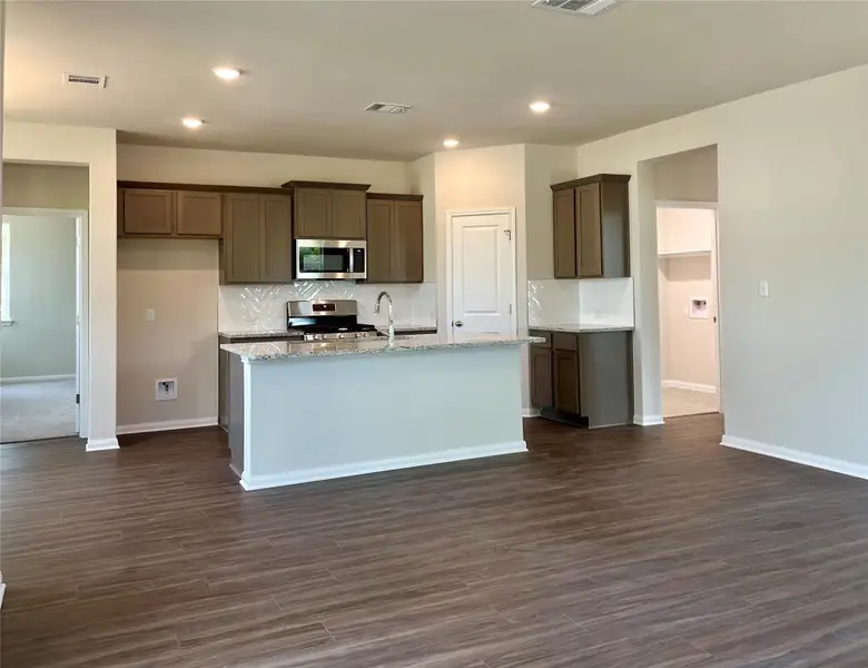 Furnished interior view inside a new home in Anthem Cottages, Kyle (Image 6).