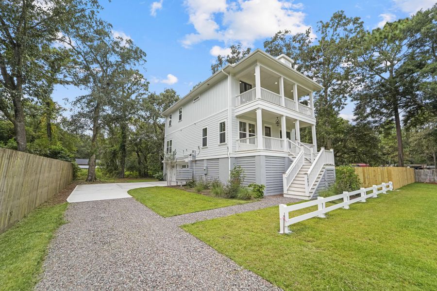 Exterior details and patio area of a home in , Johns Island (Image 38).