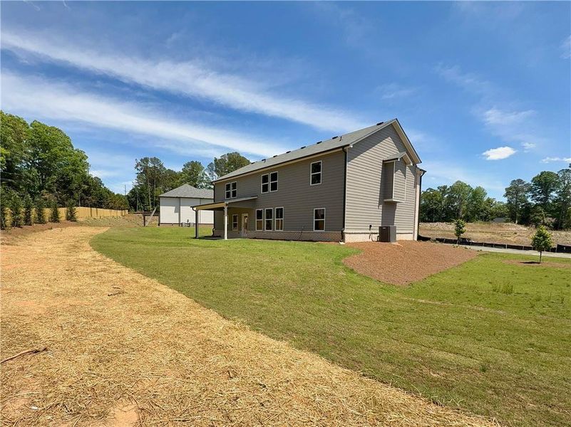 Exterior details and patio area of a home in , Hoschton (Image 22).
