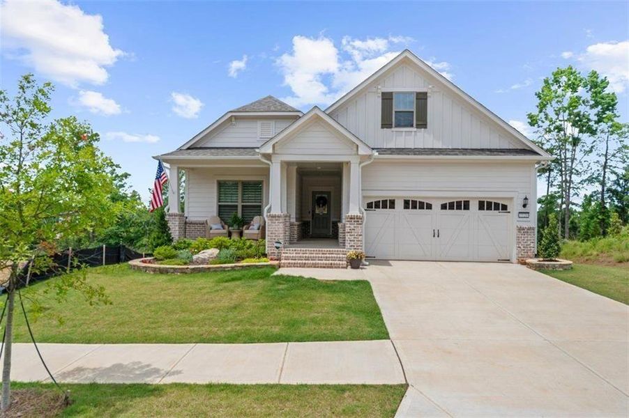 Front exterior of a new home in , Hoschton, GA, highlighting curb appeal (Image 1). Front exterior of a new home in , Hoschton, GA, highlighting curb appeal (Image 1).