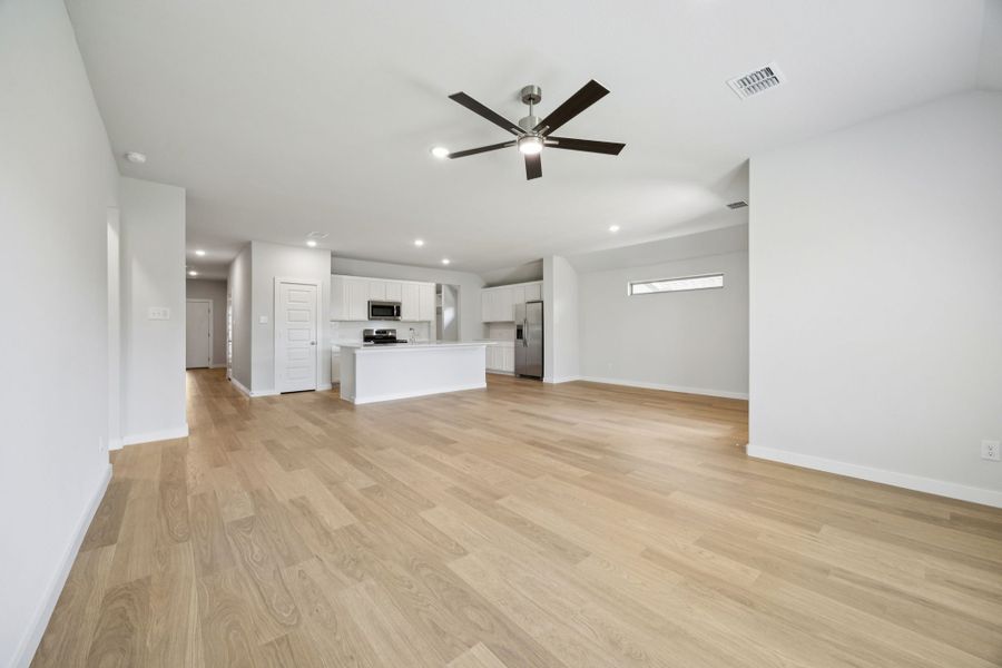 First Floor in the Heisman home plan by Trophy Signature Homes – REPRESENTATIVE PHOTO First Floor in the Heisman home plan by Trophy Signature Homes – REPRESENTATIVE PHOTO