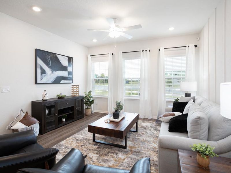 Enjoy a warm and open living area in your new bungalow in St. Cloud - Aria home plan by Highland Homes