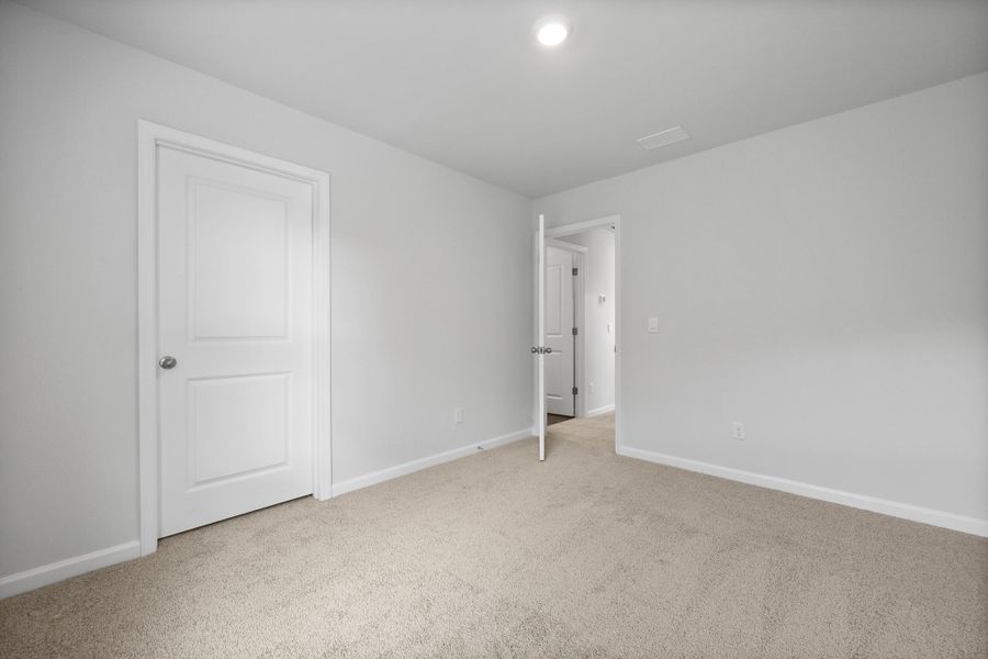 Spacious, unfurnished interior of a new home in Pine Hills at Cane Bay, Summerville (Image 19).