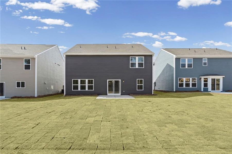 Exterior details and patio area of a home in Twin Lakes, Hoschton (Image 23).