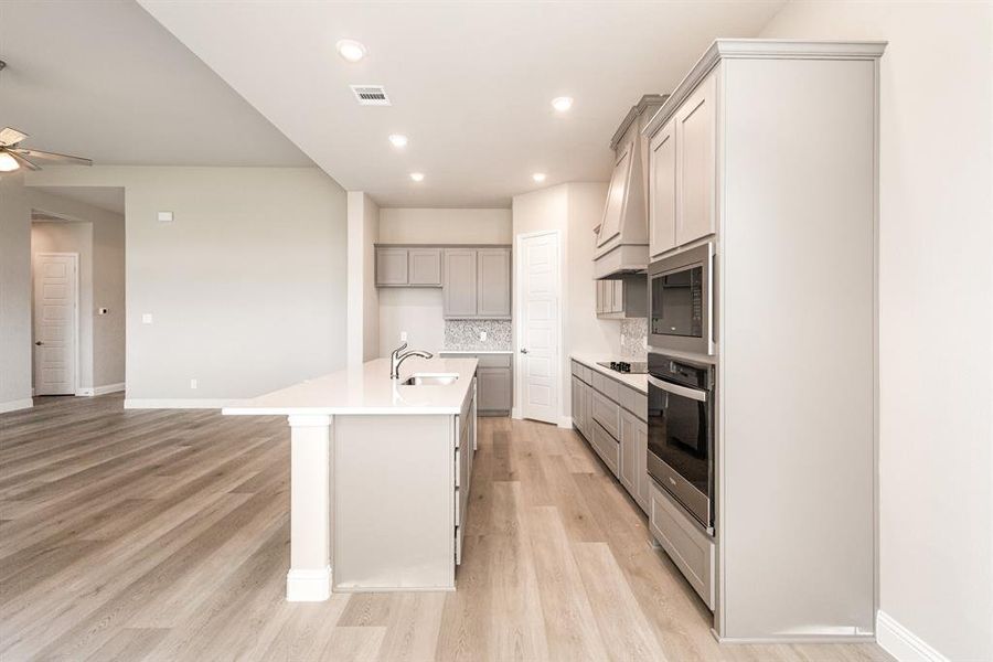 Furnished interior view inside a new home in Ten Mile Creek Estates, DeSoto (Image 7).
