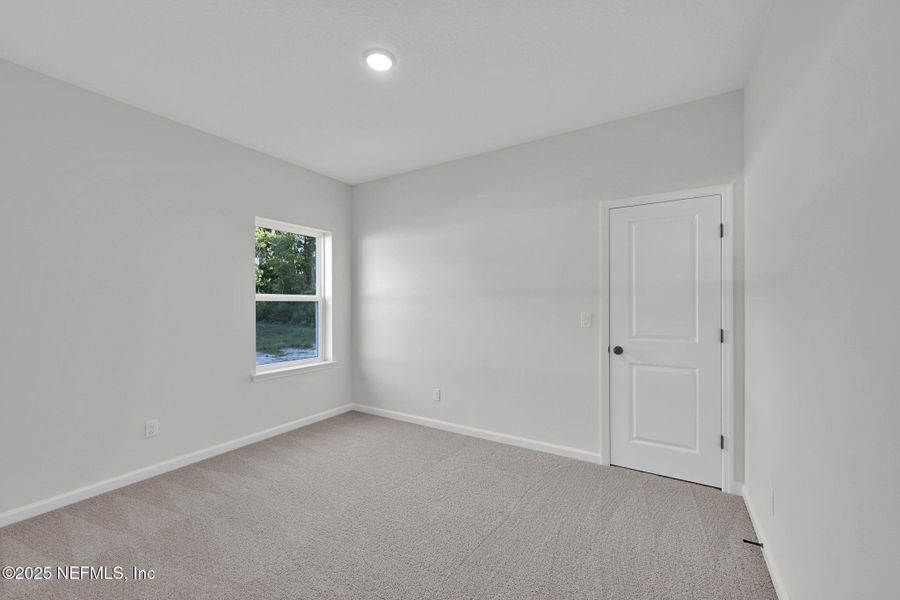 Spacious, unfurnished interior of a new home in Landing at Olde Florida, St. Augustine (Image 35).