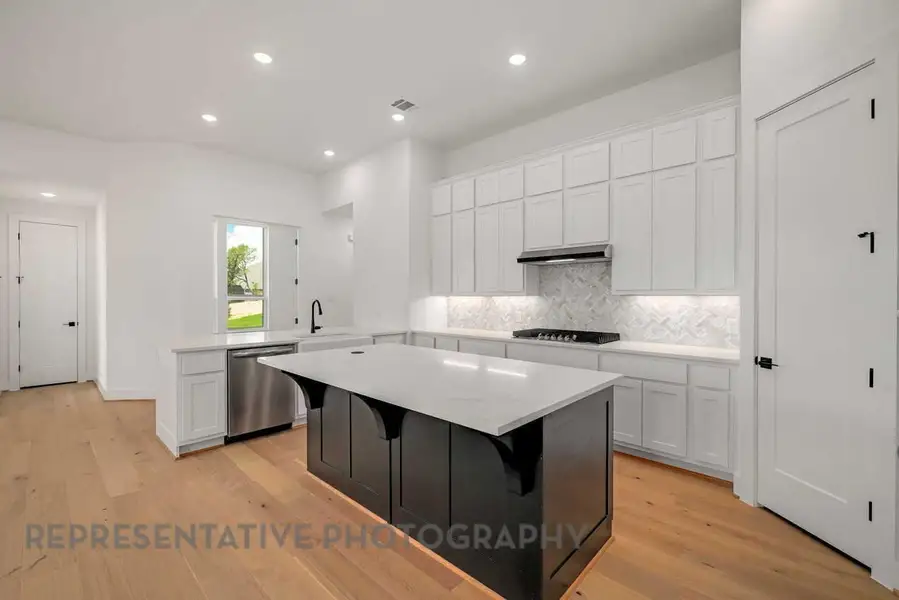 Furnished interior view inside a new home in Meridiana: 50ft. lots, Manvel (Image 4).