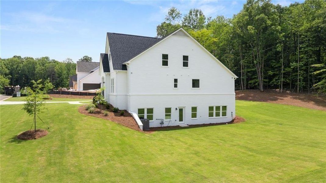 Front exterior of a new home in , Gainesville, GA, highlighting curb appeal (Image 26).
