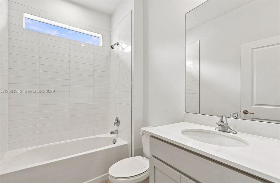 Furnished interior view inside a new home in Tradition, Port St. Lucie (Image 7).