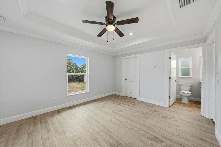 Spacious, unfurnished interior of a new home in , Port Charlotte (Image 24).