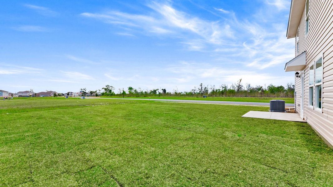 Exterior details and patio area of a home in Hodges Bayou Plantation, Panama City (Image 4).