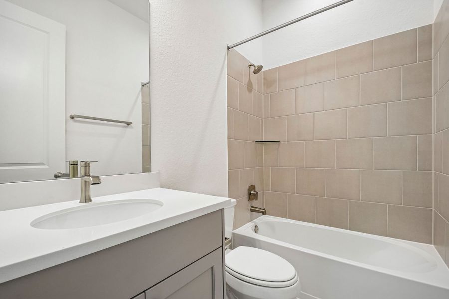 Furnished interior view inside a new home in 6 Creeks, Kyle (Image 10).