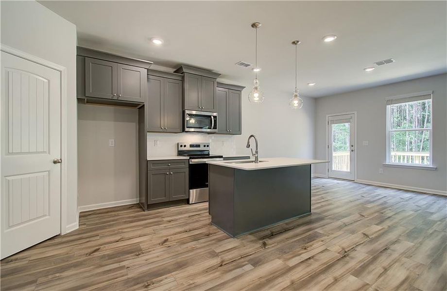 Furnished interior view inside a new home in Enclave at Evergreen, Fairburn (Image 5).