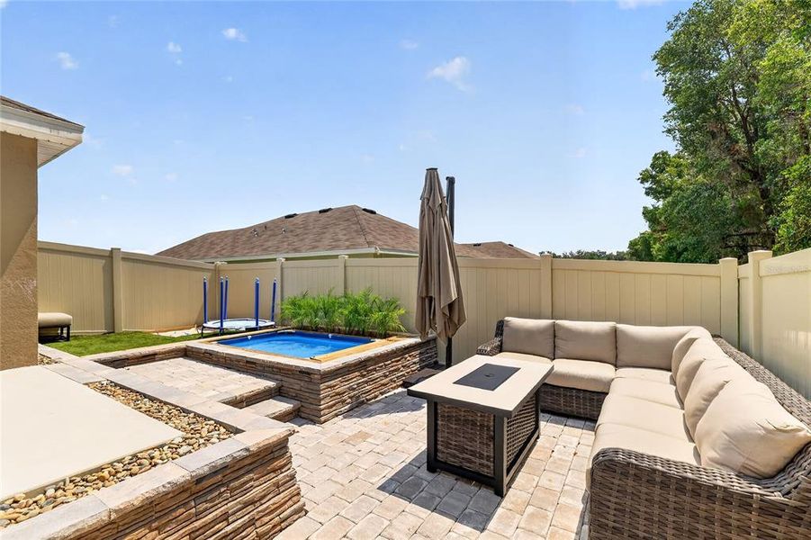 Exterior details and patio area of a home in Sunset Hills, Summerfield (Image 25).