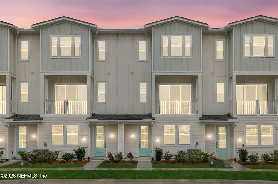 Front exterior of a new home in , Jacksonville Beach, FL, highlighting curb appeal (Image 24).